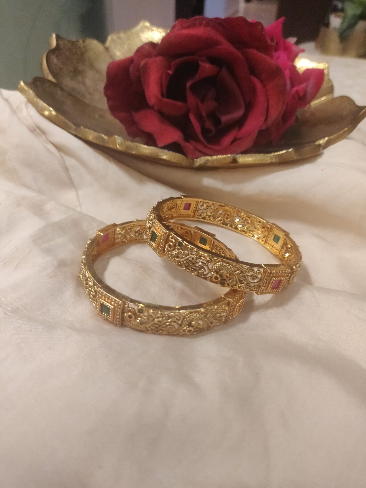 Dazzling red green stone peacock bangles set of 2