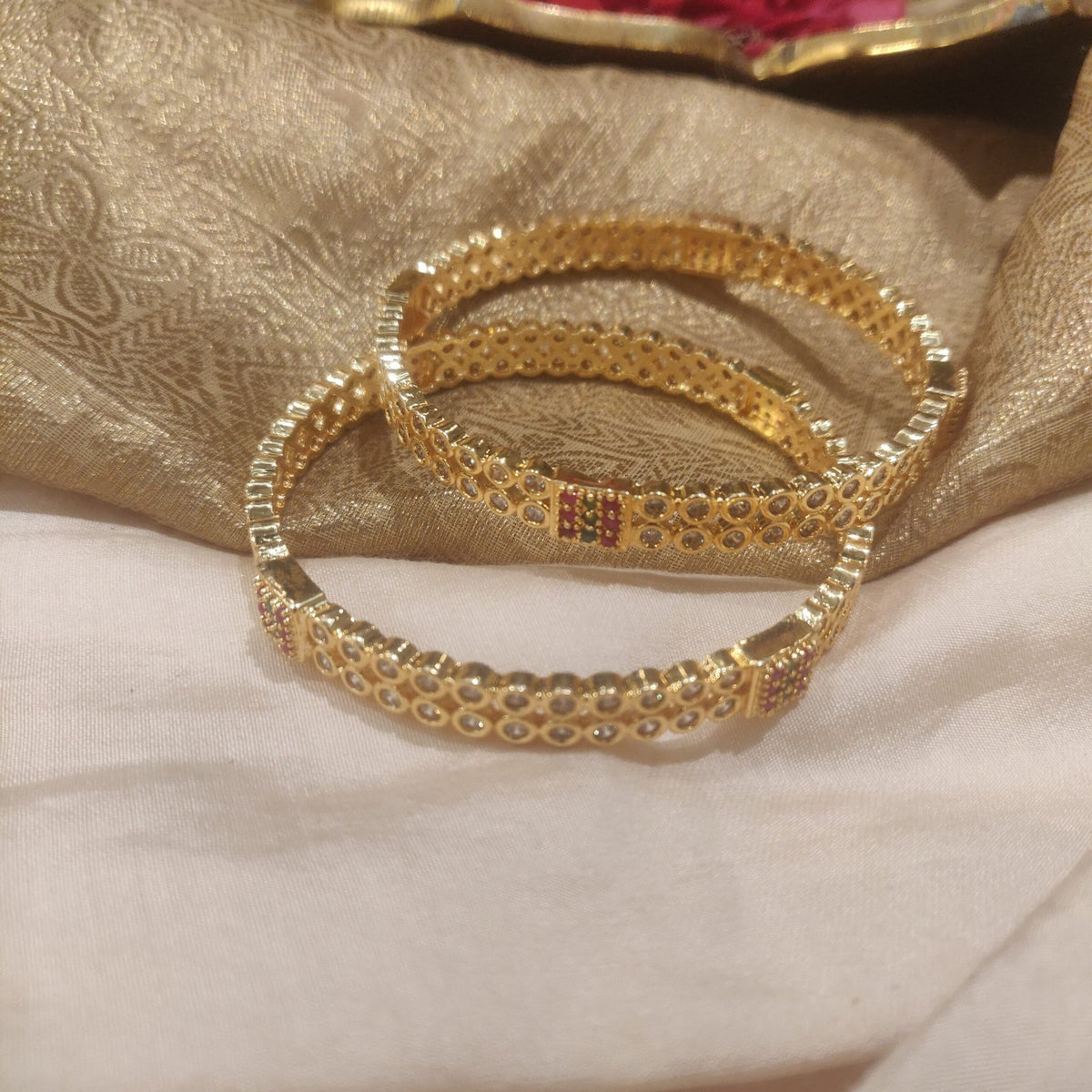 Timeless red and green stone and ad stone golden bangels