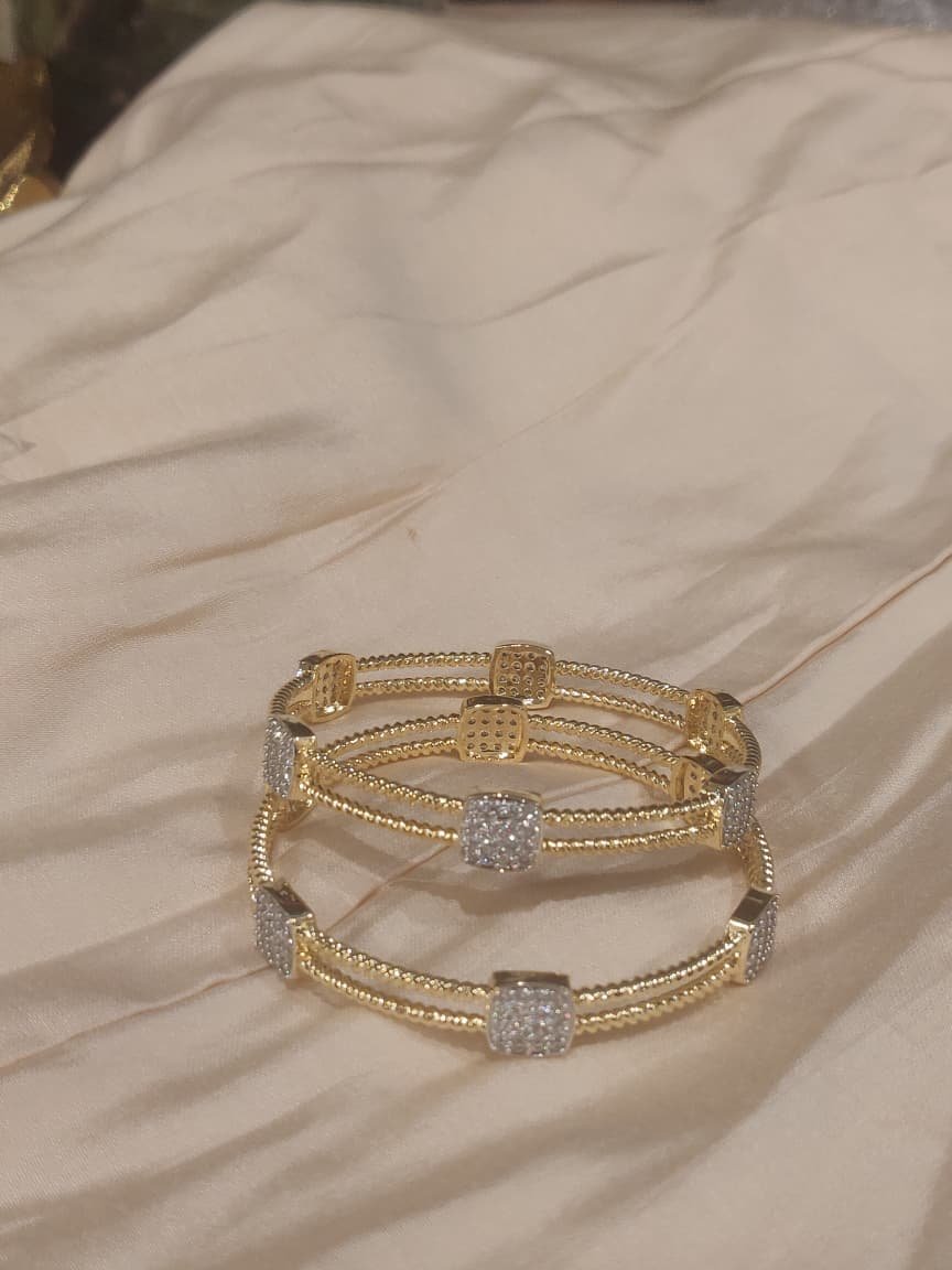 Dazzling ad stone bangles set of 2