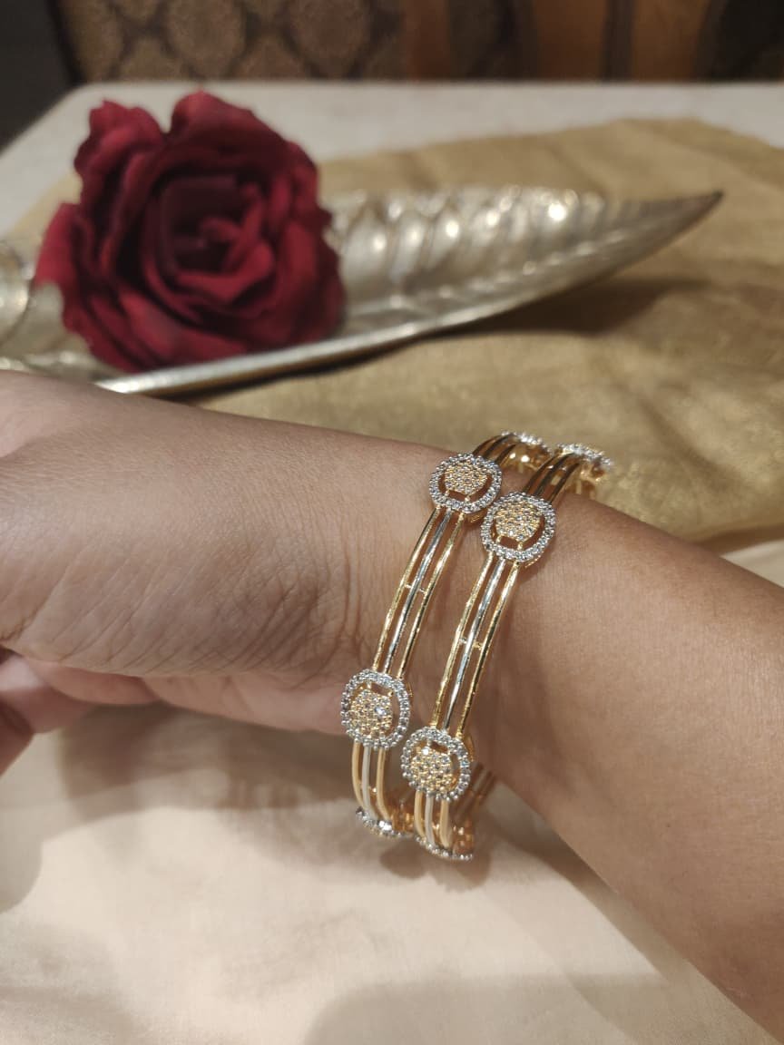 Elegant floral golden bangles set of 2