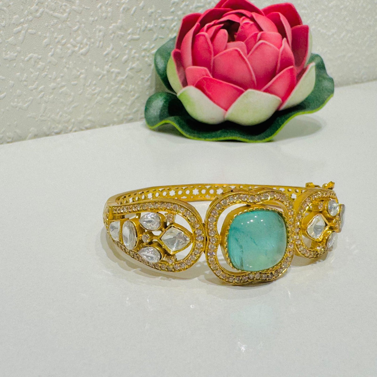 Lustrous crystal stone kada with skyblue ad stone
