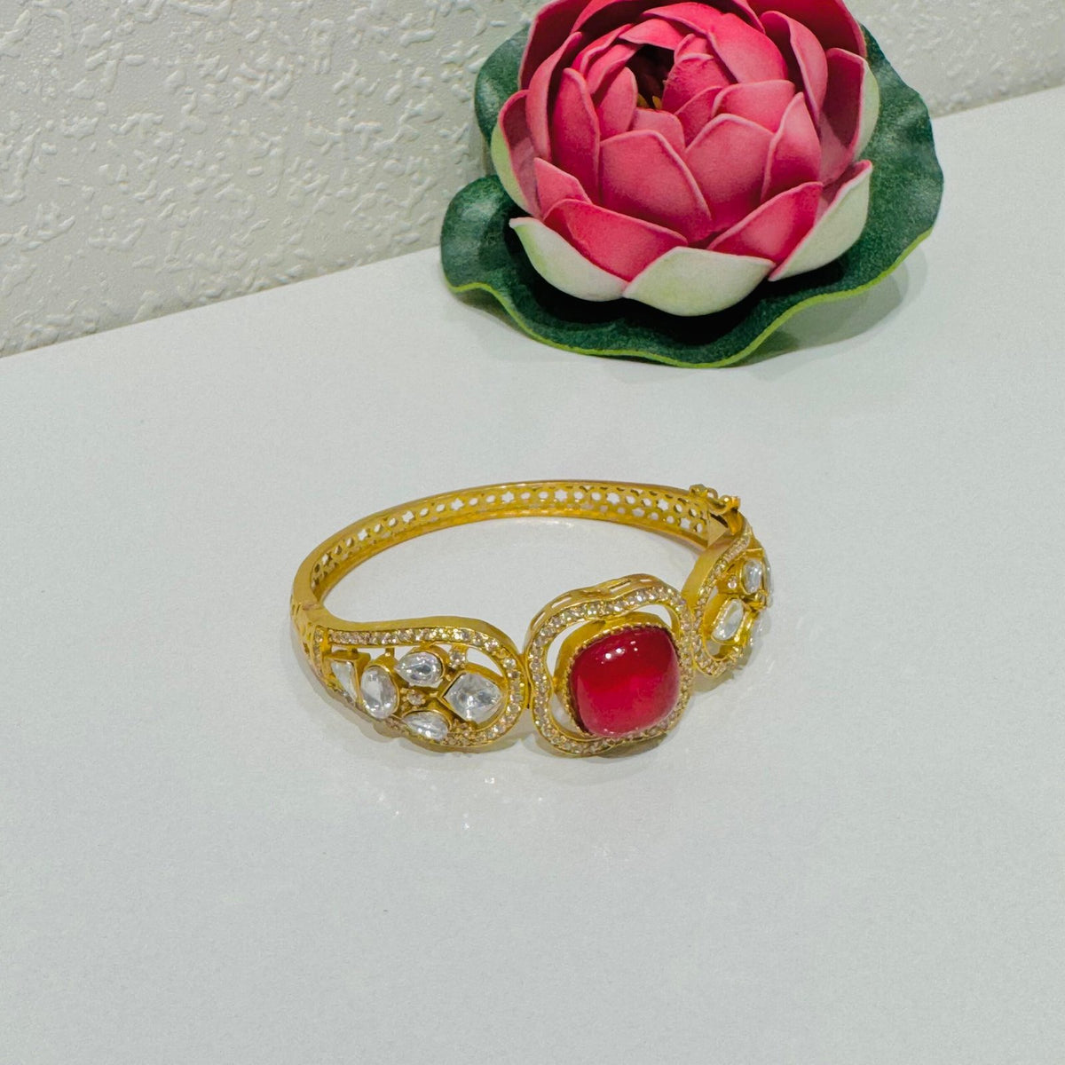 Lustrous crystal stone kada with red ad stone