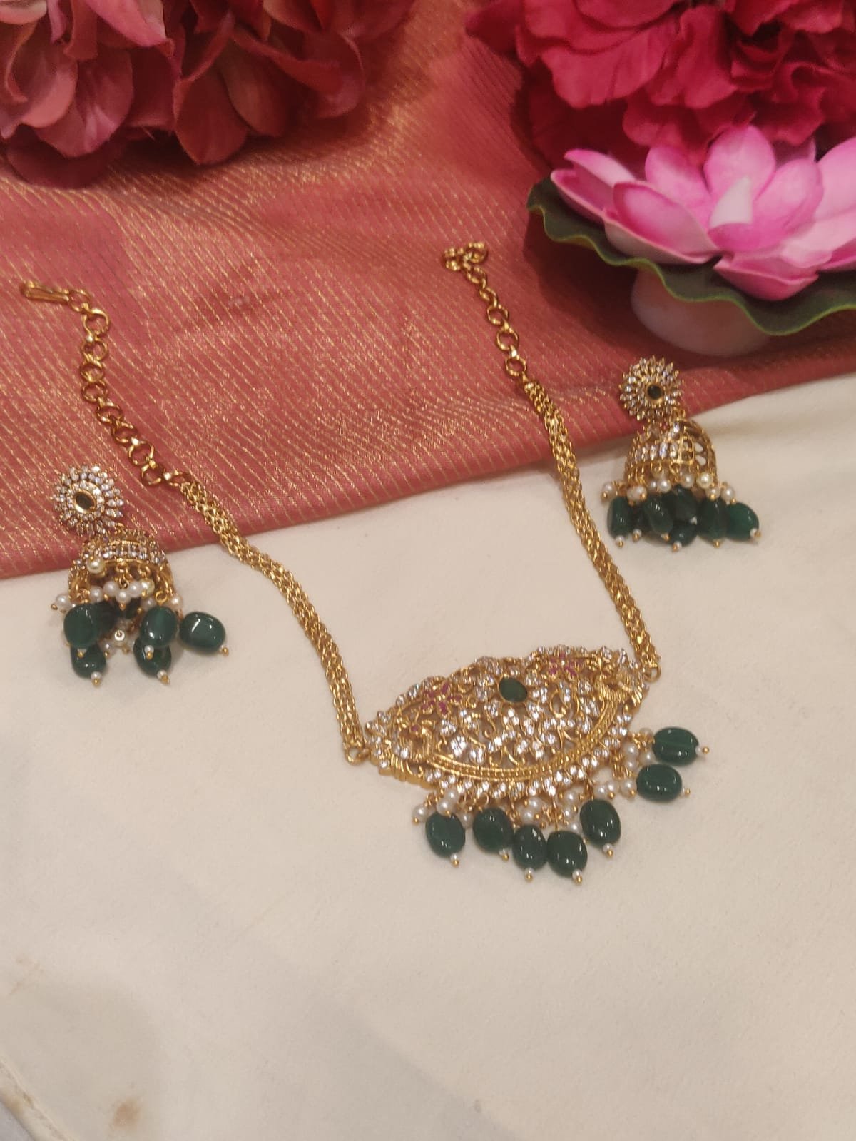Opulent gold plated peacock design green beads styled ad chain choker