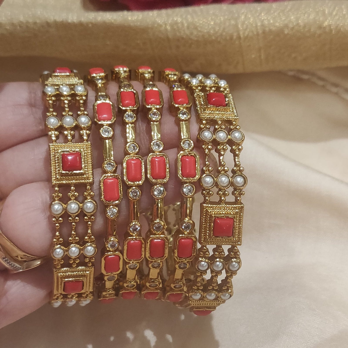 Rare orange with pearls and golden bangels