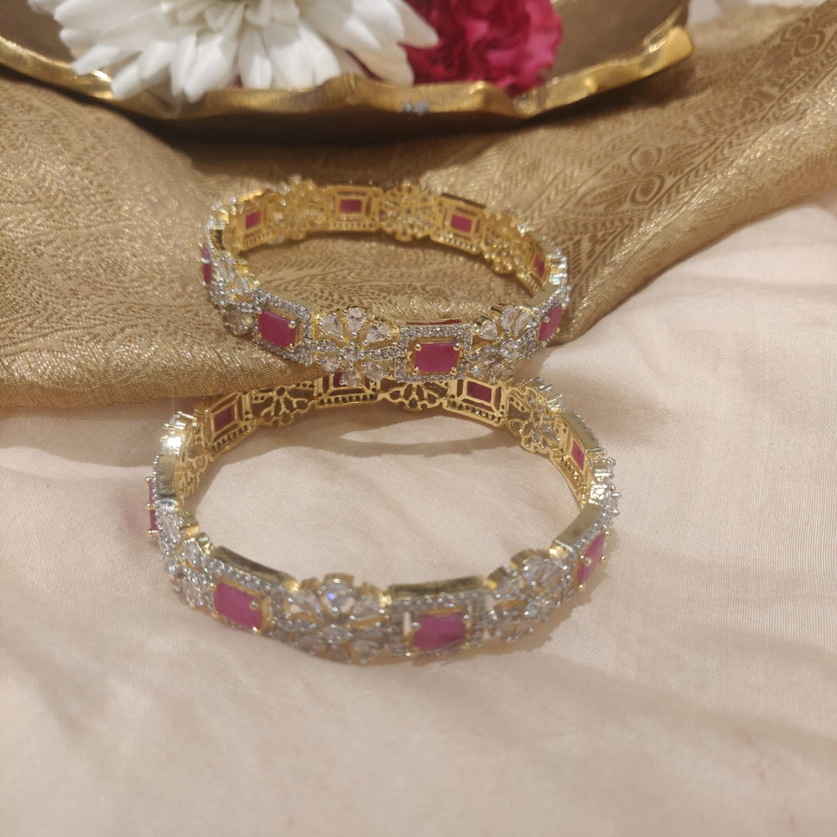 Lustrous sparkling ruby stone and ad stone golden bangels