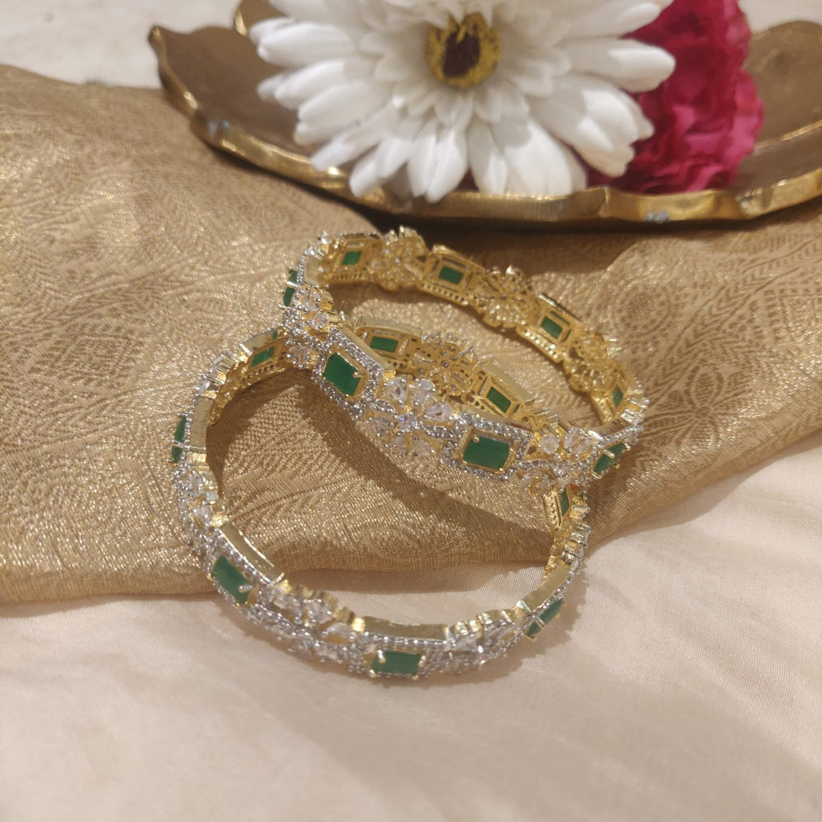 Sparkling green stone and ad stone golden bangels