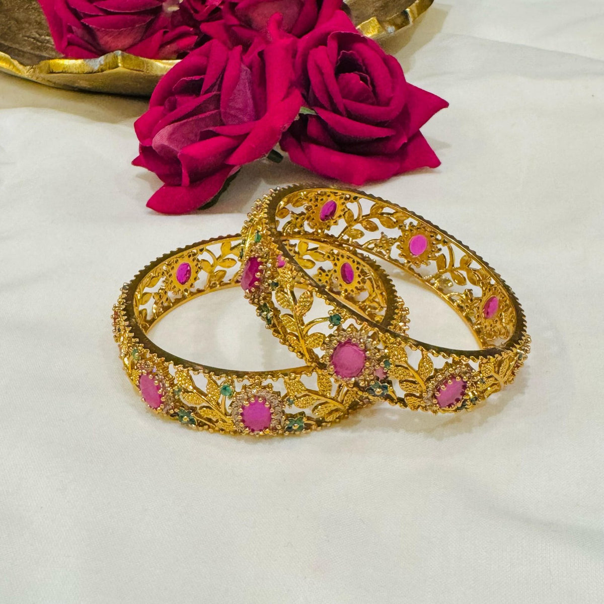 Red floral design golden bangels