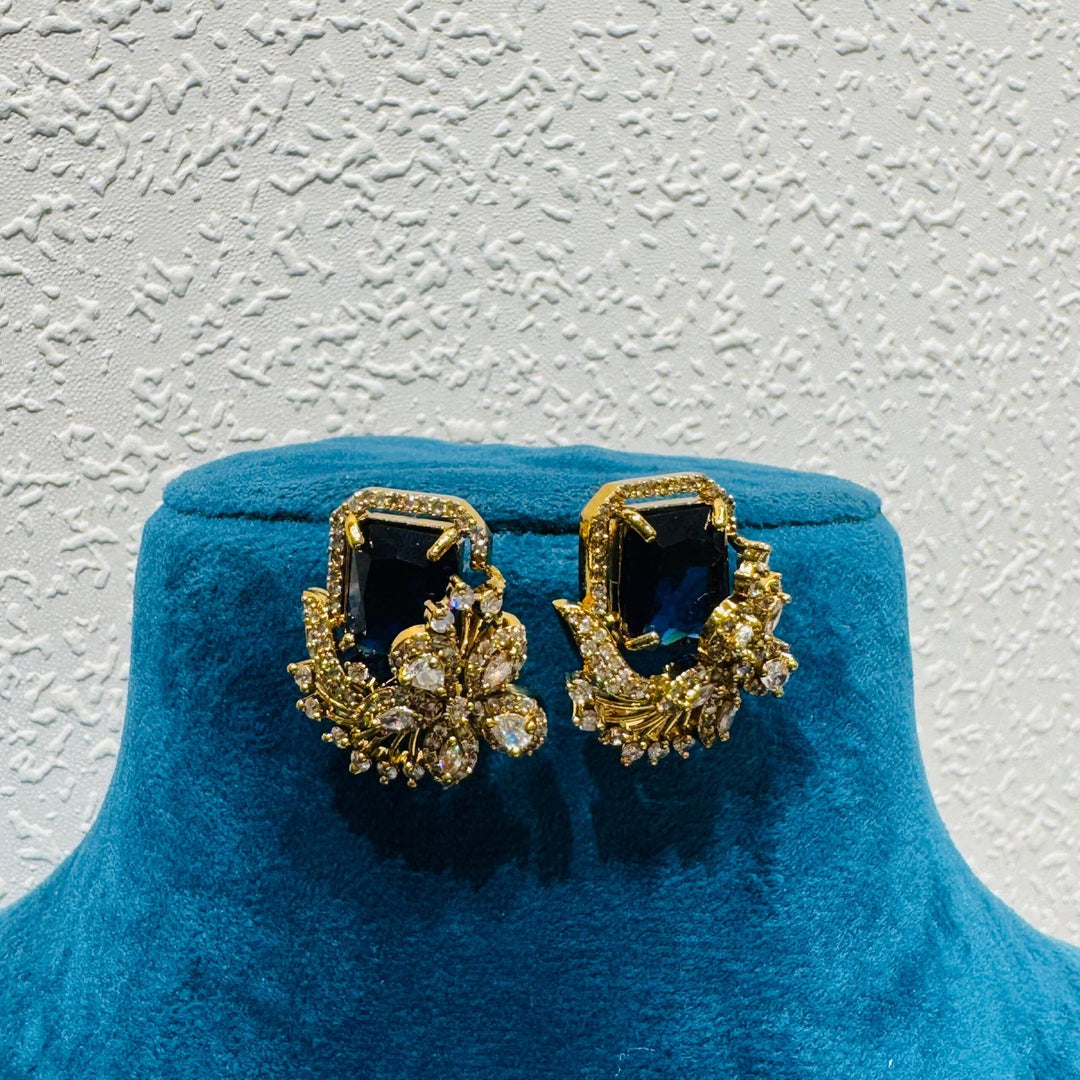 Elegant Dazzling Lustrous deep blue  stone and ad stone floral design earring