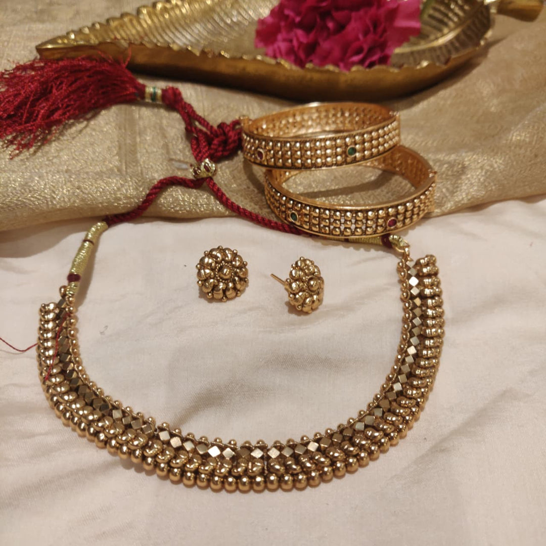 Dazzling Golden Multishape Necklace Bangles Combo set