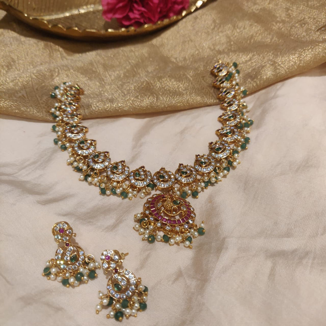 Inimitable Peacock Crystal Ruby Stone Necklace