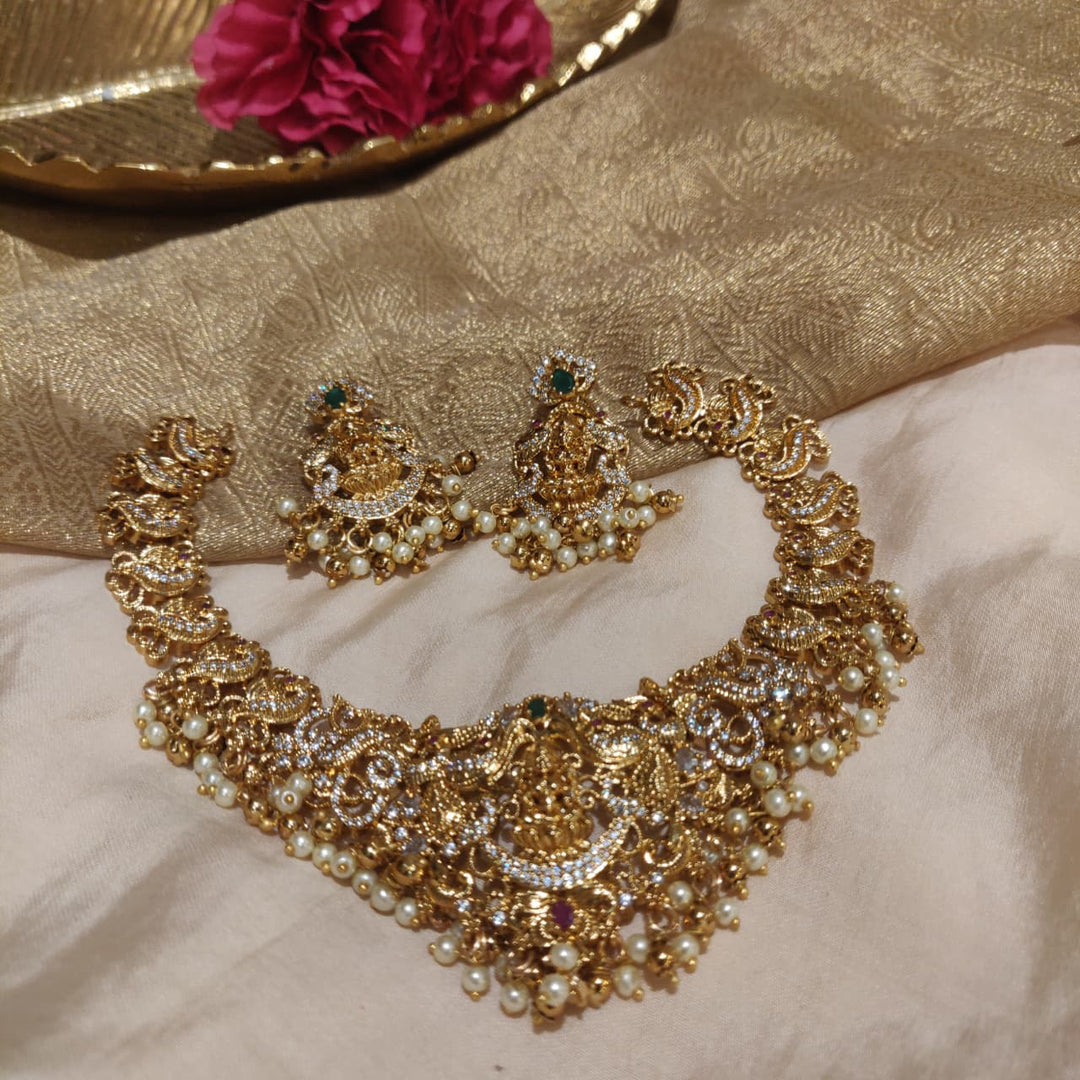 Timeless AD Stone Golden Lakshmi Peacock Necklace
