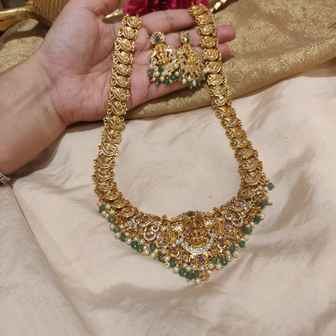 Timeless AD Stone Golden Lakshmi Peacock Long Necklace