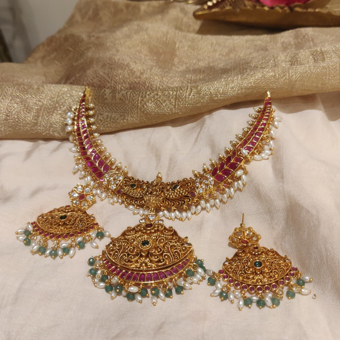 Elegant Golden Ruby AD Stone Temple Necklace with Ricepearl beads