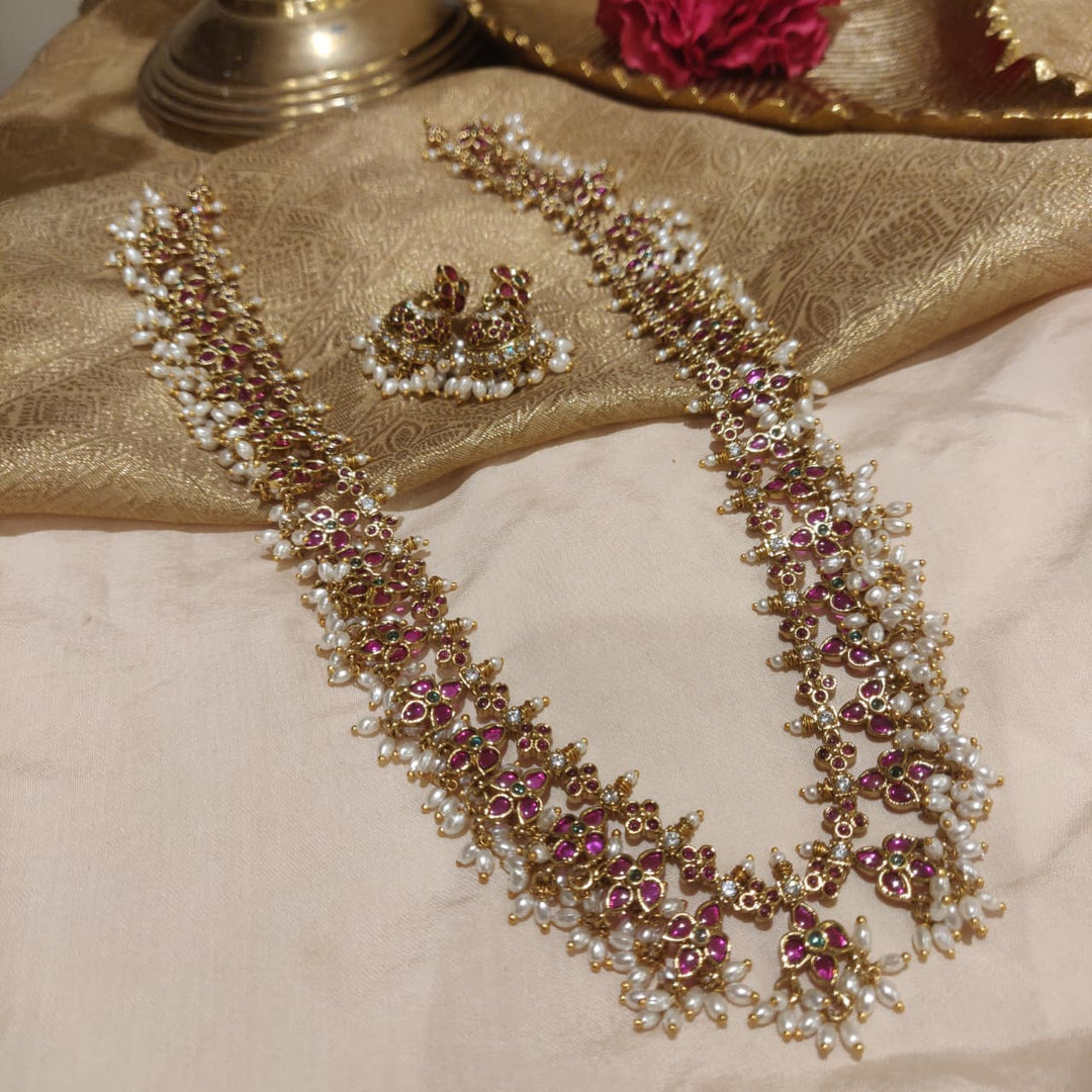 Refined Ruby AD Stone Floral RicePearl Long Necklace