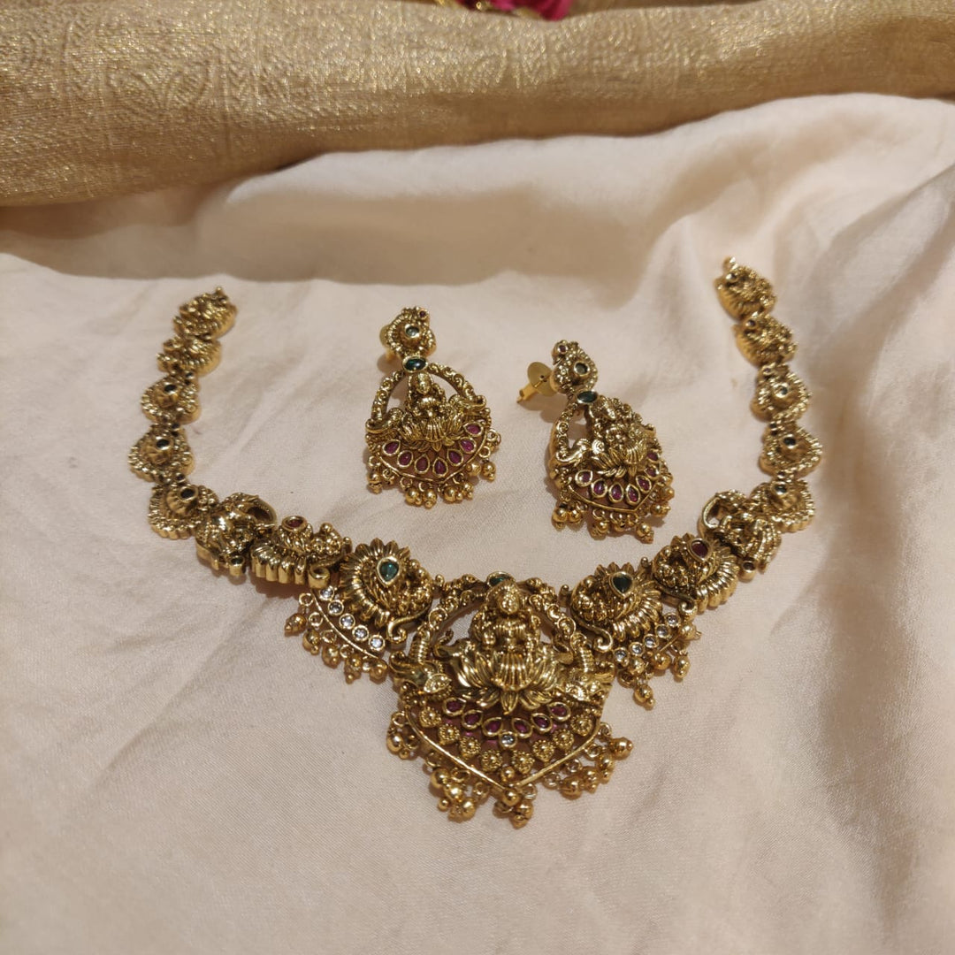 Mesmerizing Ruby Green AD Stone Floral Temple Necklace