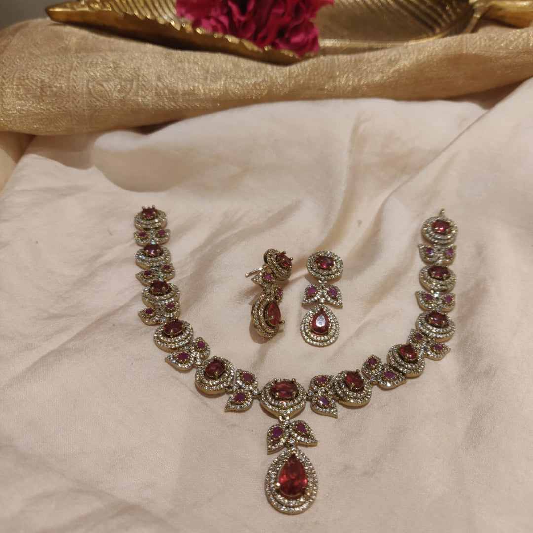 Lustrous Ruby AD Stone Leafy Necklace