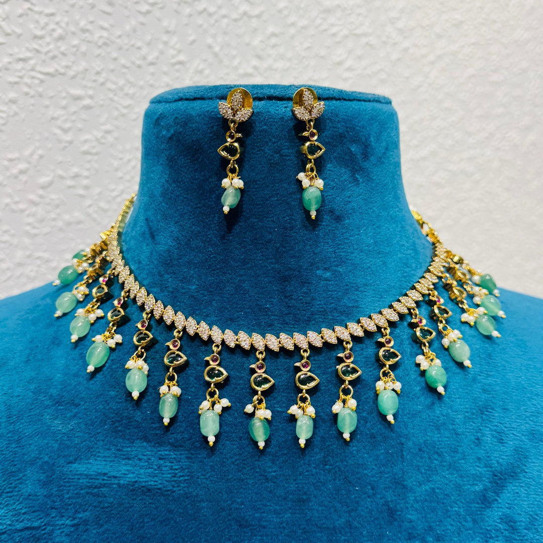 Brilliant zig zag link ad stone with blue bids choker necklace