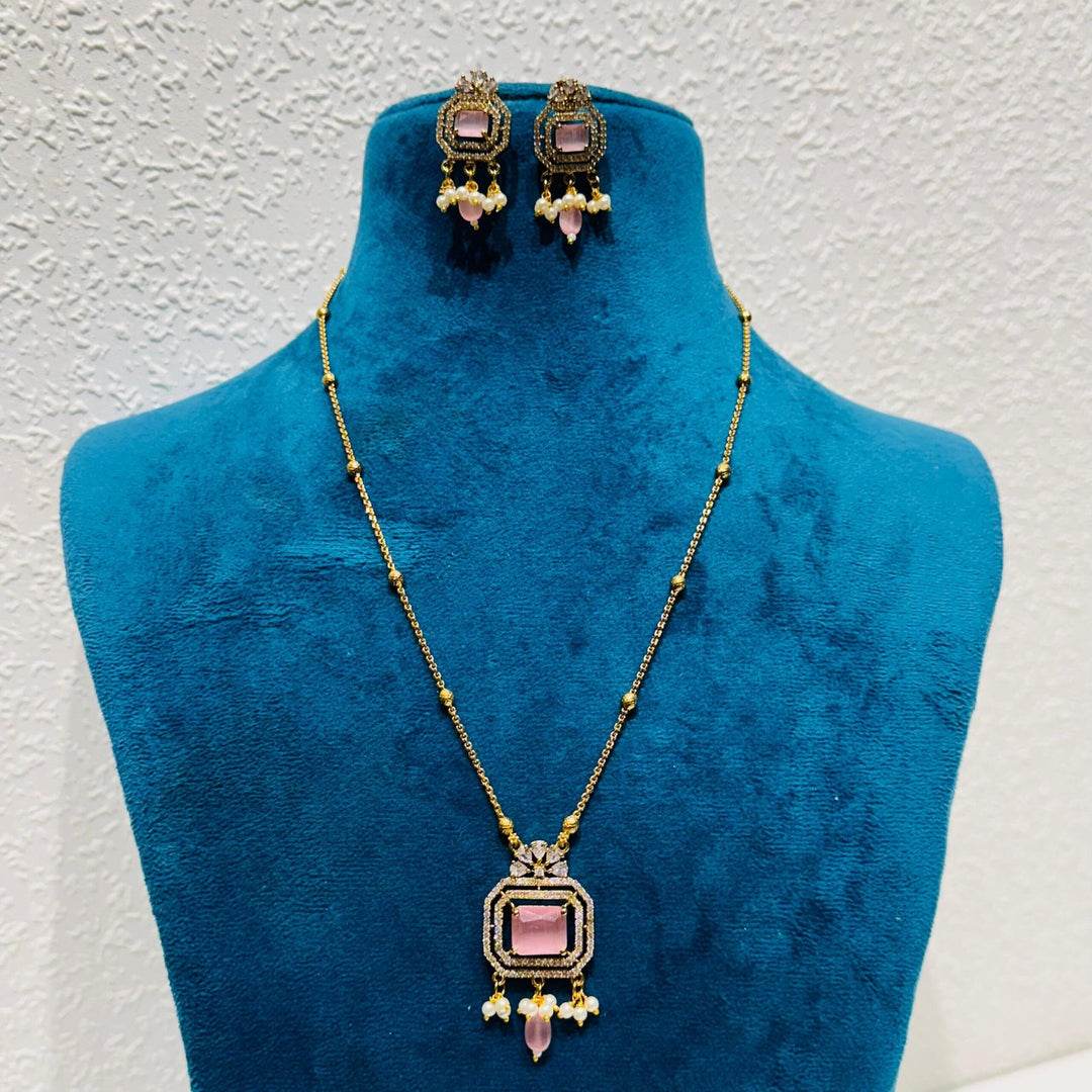 Iconic Posh pink rose  stone with ad stone and pearls golden chain necklace
