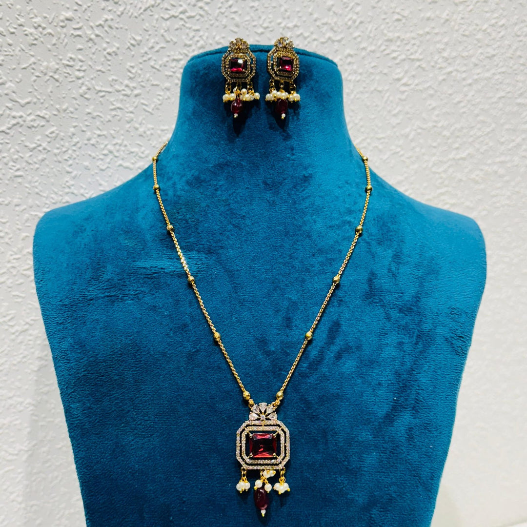 Iconic Posh red blood  stone with ad stone and pearls golden chain necklace