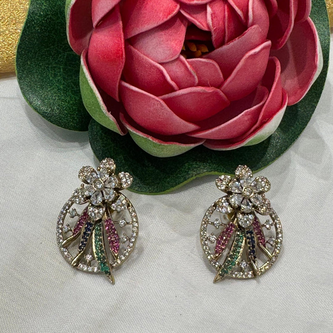 Bespoke tulip flower with ruby and emerald stone earring