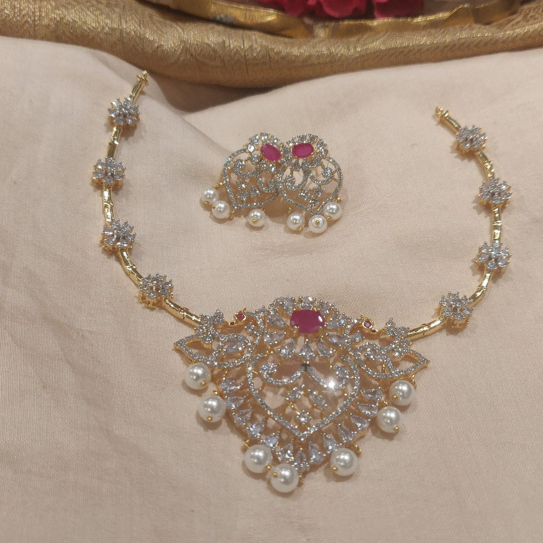 Timeless floral design with ruby stone with pearls and golden choker necklace