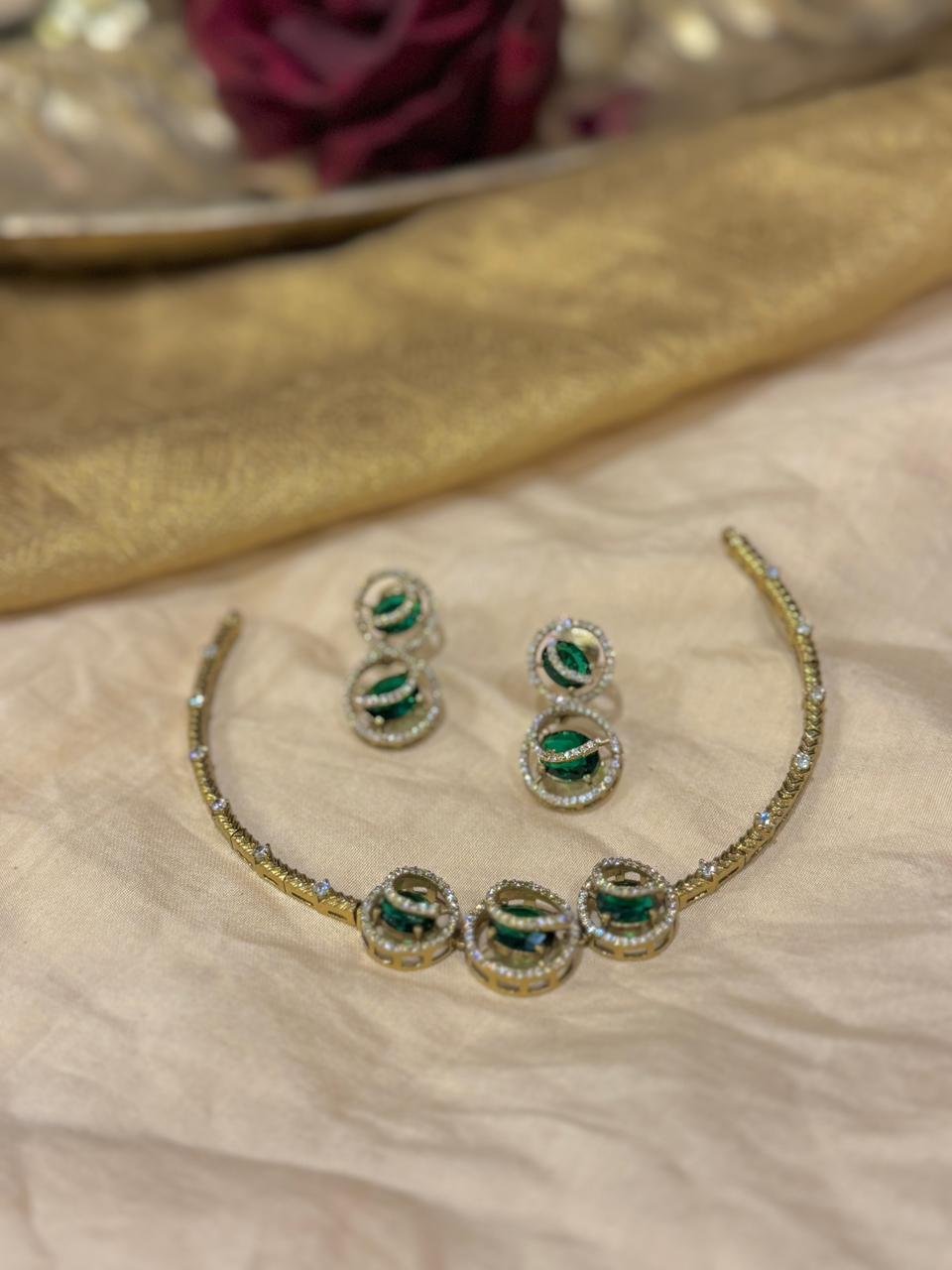 Jubilant Golden Pipe Necklace with Green AD Stone