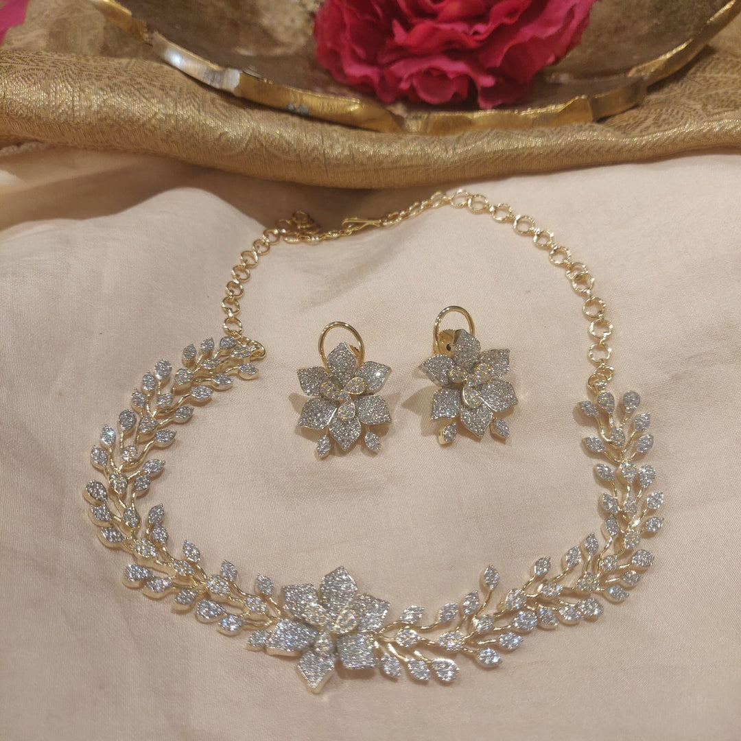 Dazzling floral design with ad stone and goden choker chain necklace