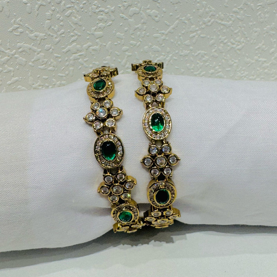 Sought emerald and ad stone floral bangels