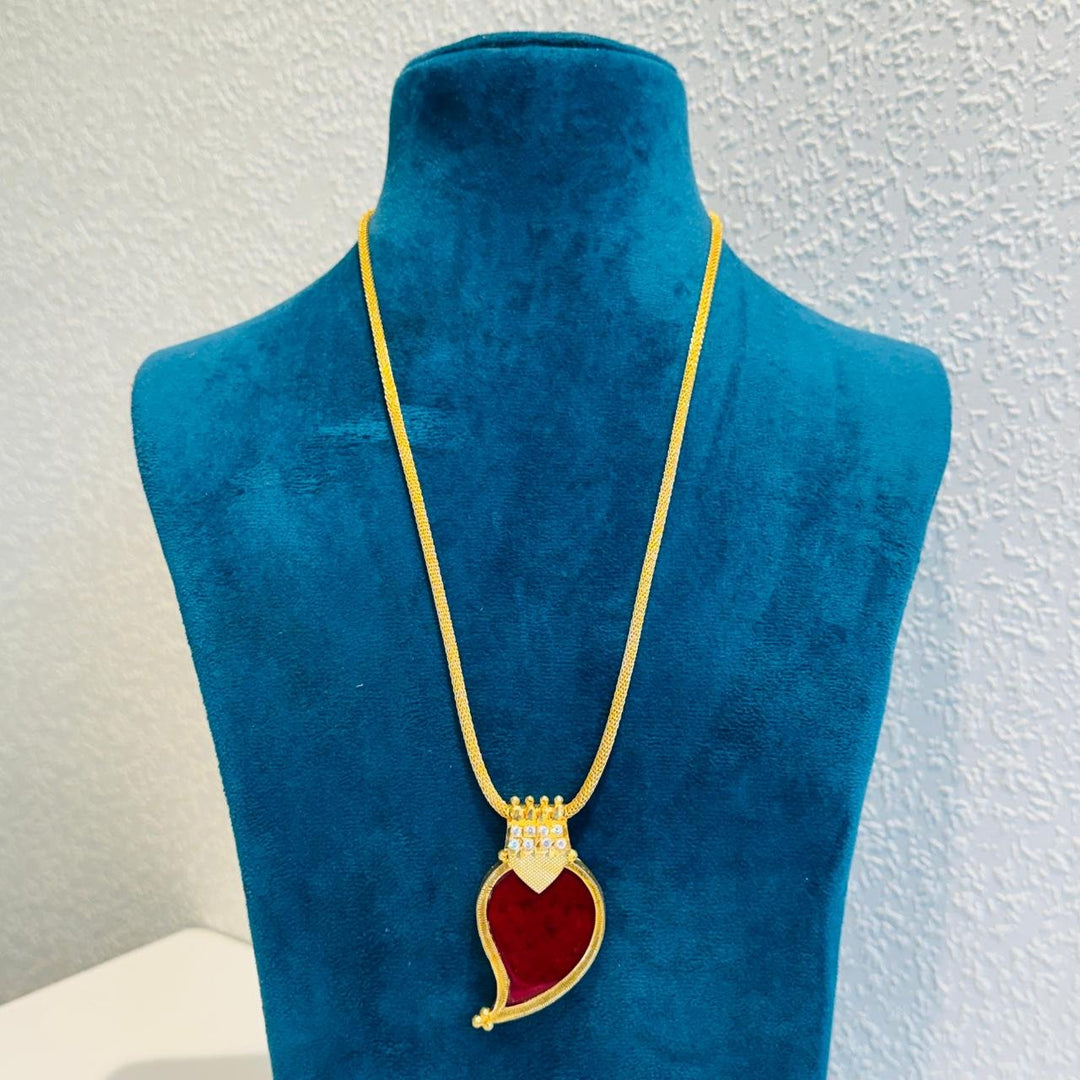 Alluring Red Stone Pendant With Golen Chain
