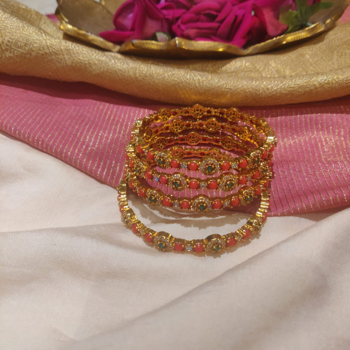 Royal coral & gold toned statement bangles set