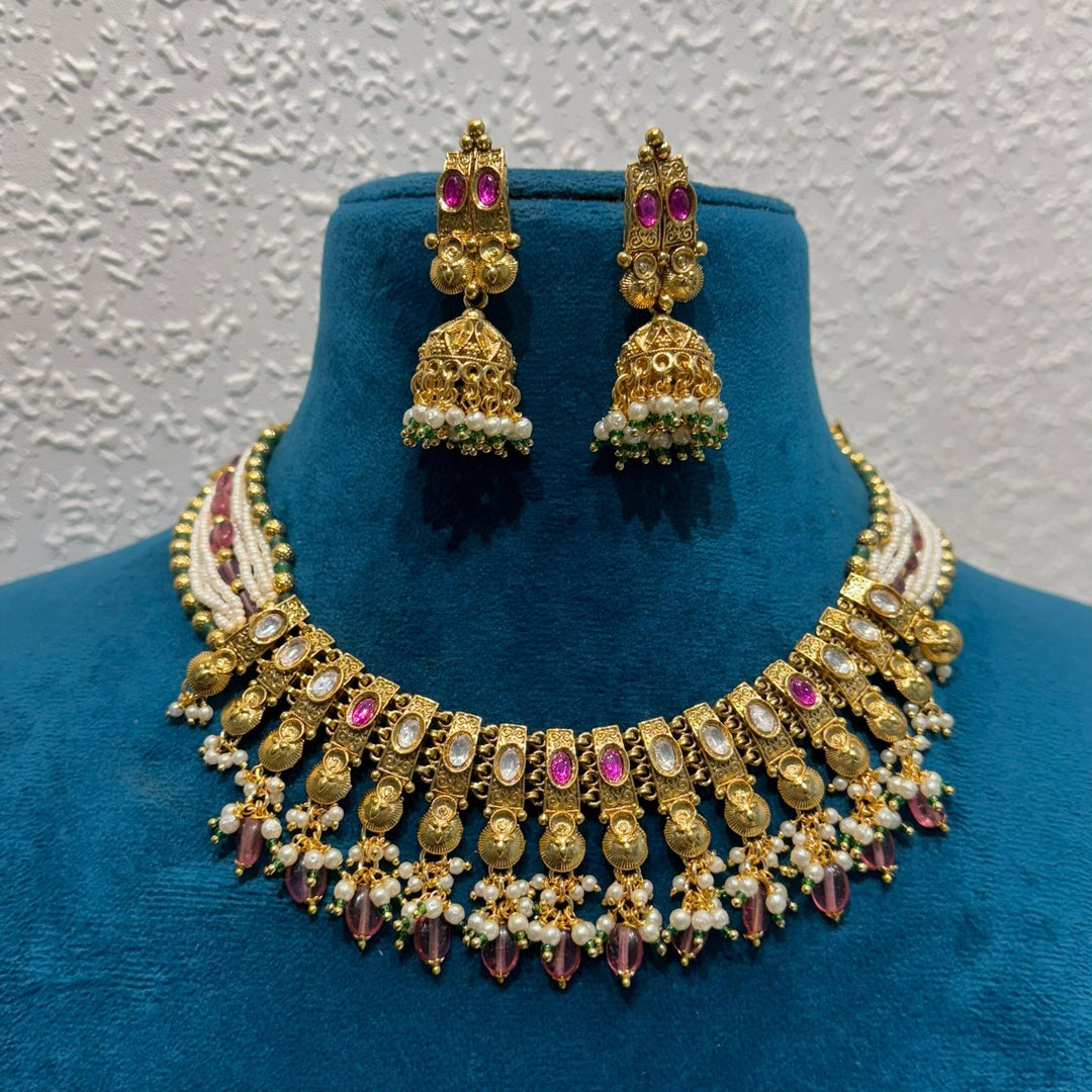 Delicate fallen design ad stone and ruby with pearls and red beads choker necklace