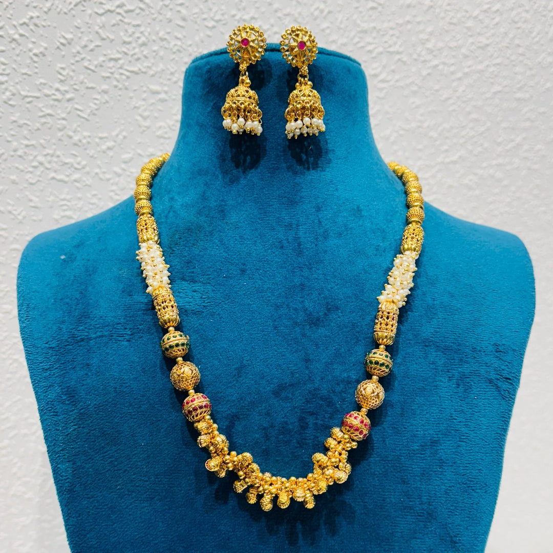 Captivating ladoo design golden with perals haar necklace
