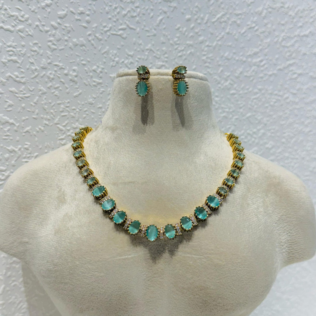 Brilliant Elegant Glamorous ocean blue stone with ad joints golden necklace