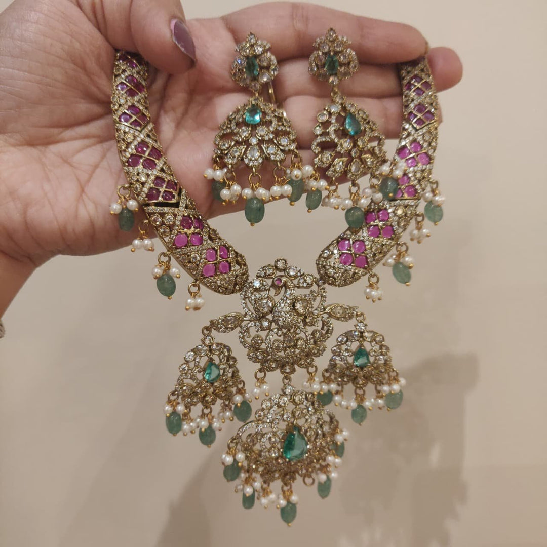 Timeless Ruby Stone Peacock Droplet Necklace