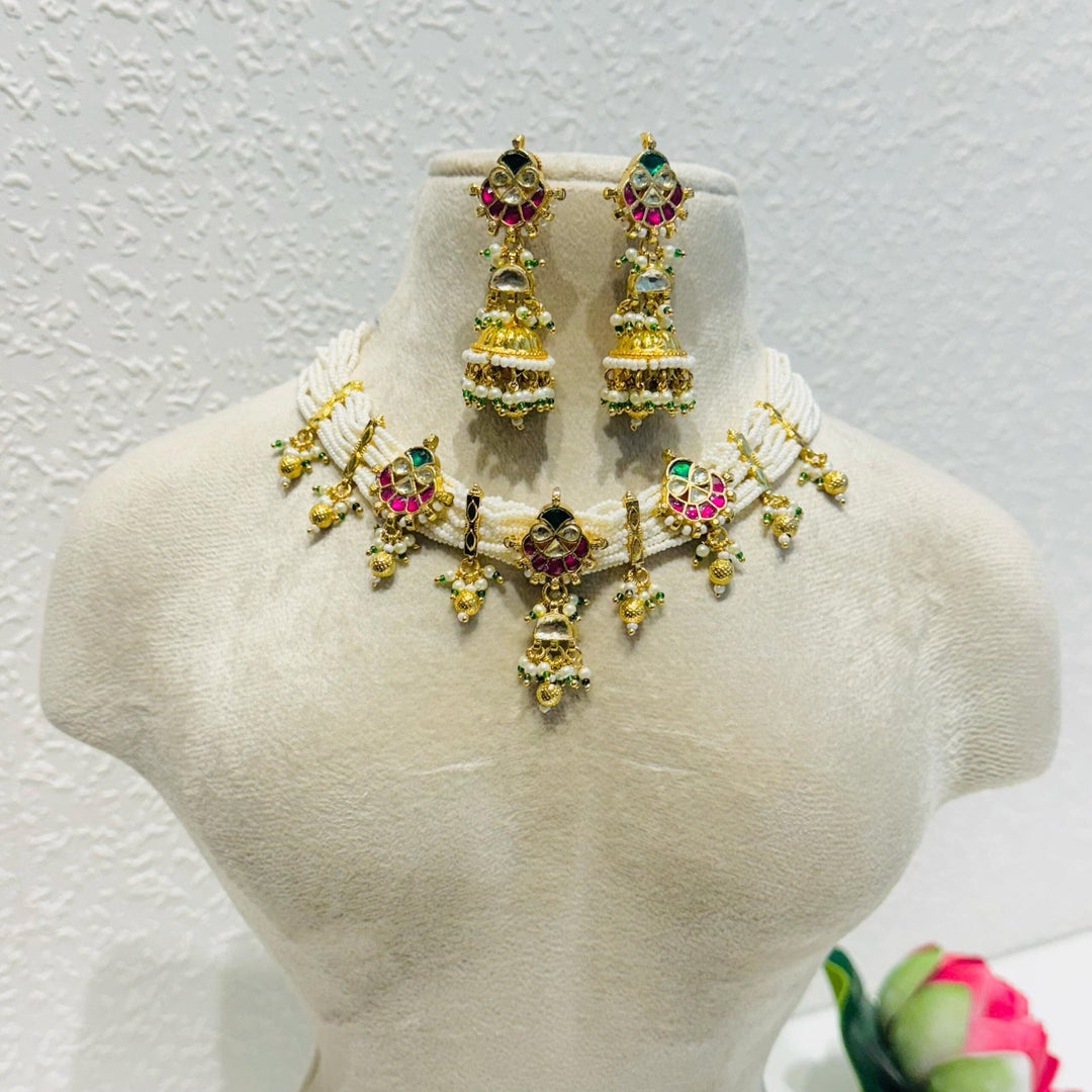 Dazzling Lustrous Sparkling Exquisite leaf  design with pearls and green beads and golden moti choker haar necklace