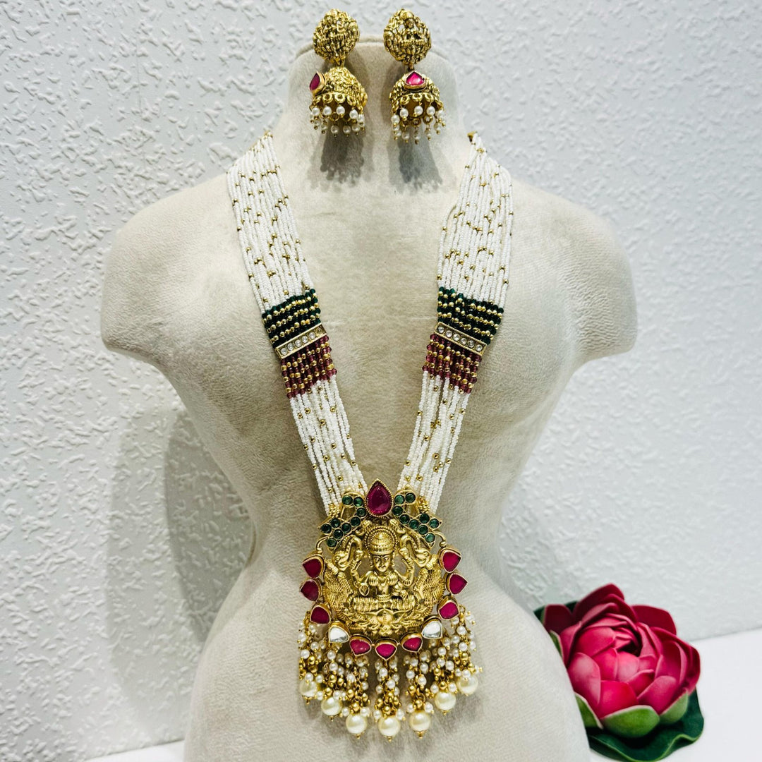 Sought Exquisite laxmi design with red  pearls and green beads and moti multi layer haar necklace