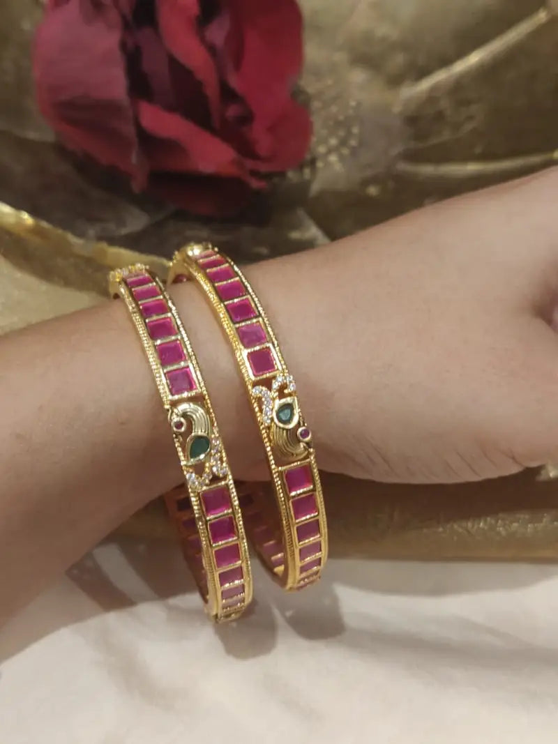 Timeless ruby stone peacock bangles set of 2
