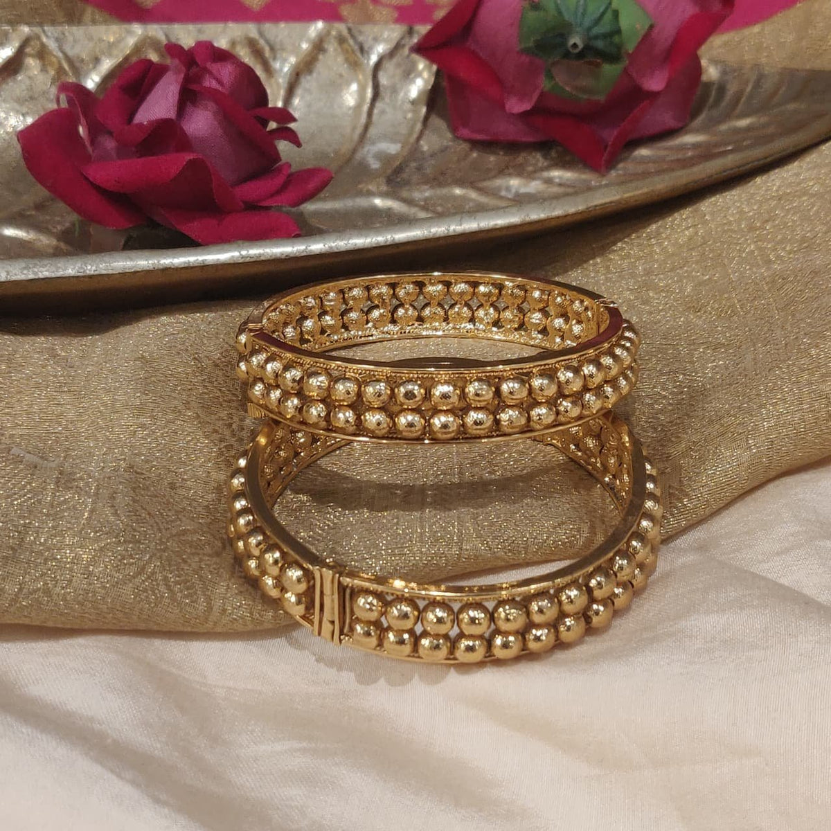 Radiant round golden bangles set of 2