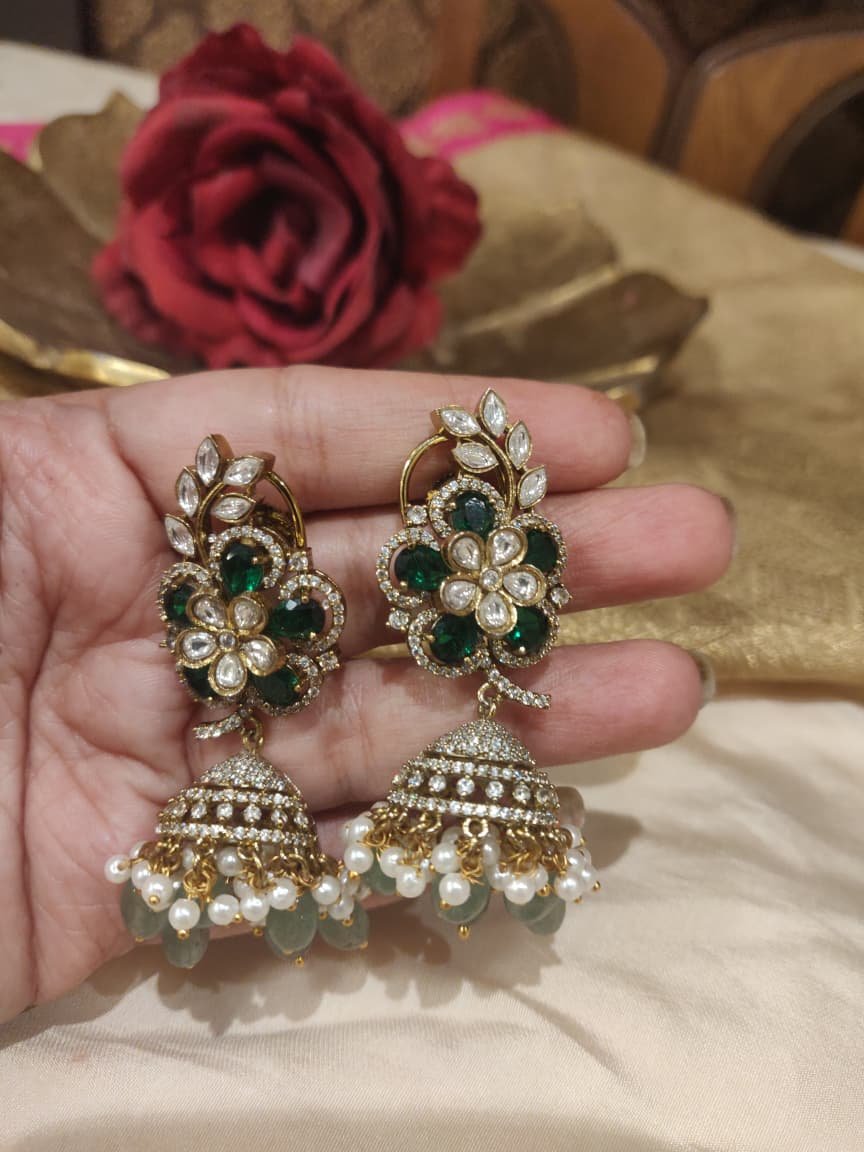 Sparkling Green Stone Floral Jhumka with White Beads