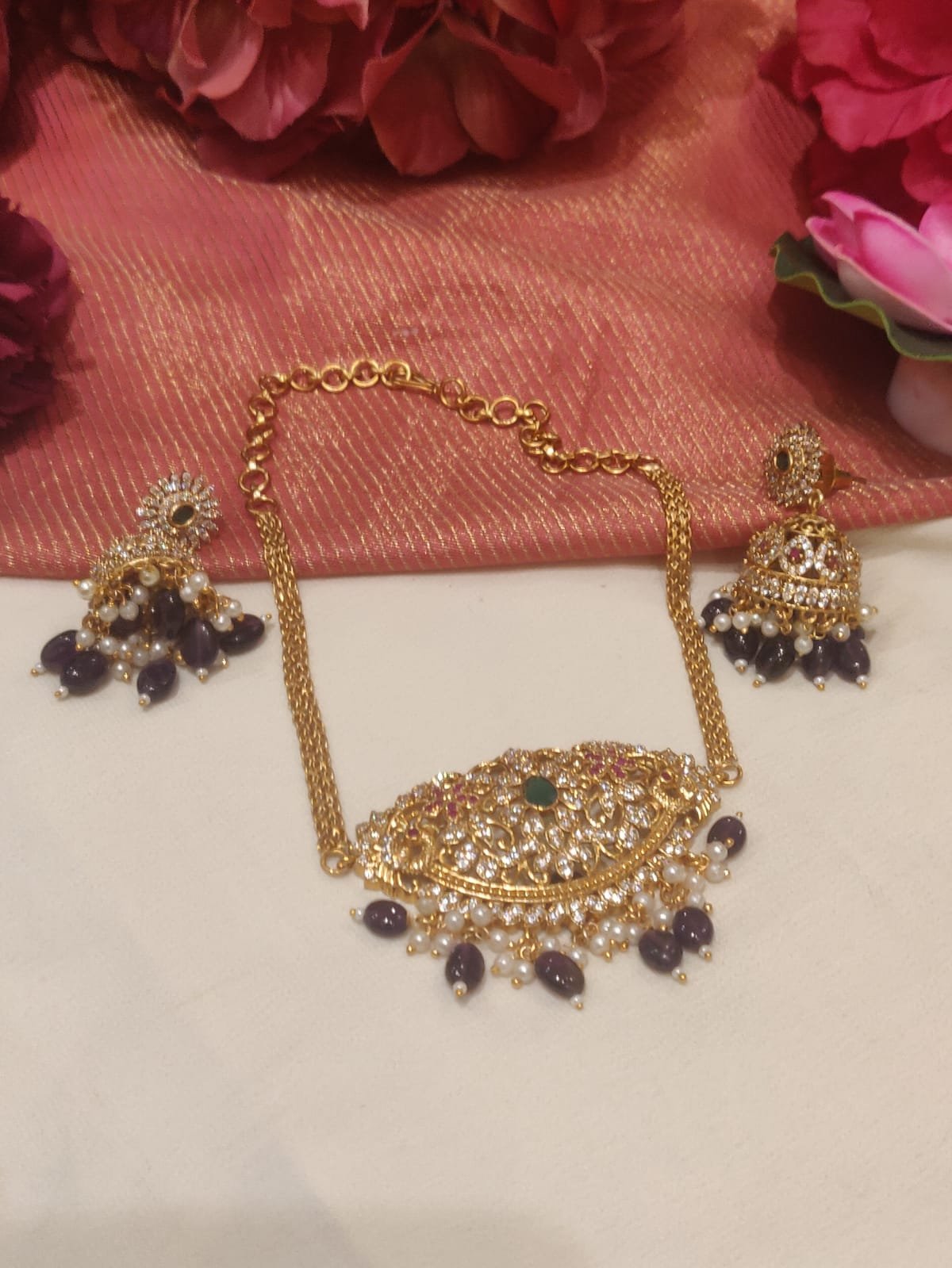 Opulent gold plated peacock design purple beads styled ad chain choker