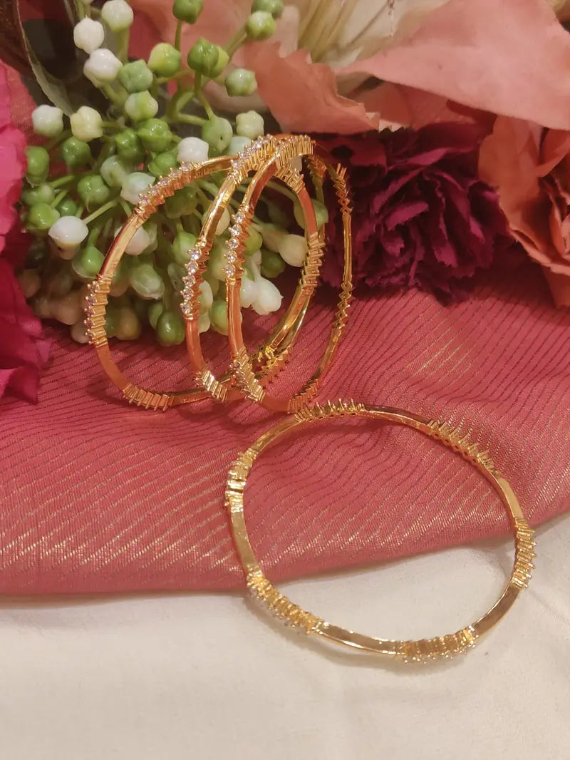 Captivating ad white stone bangles set of 4