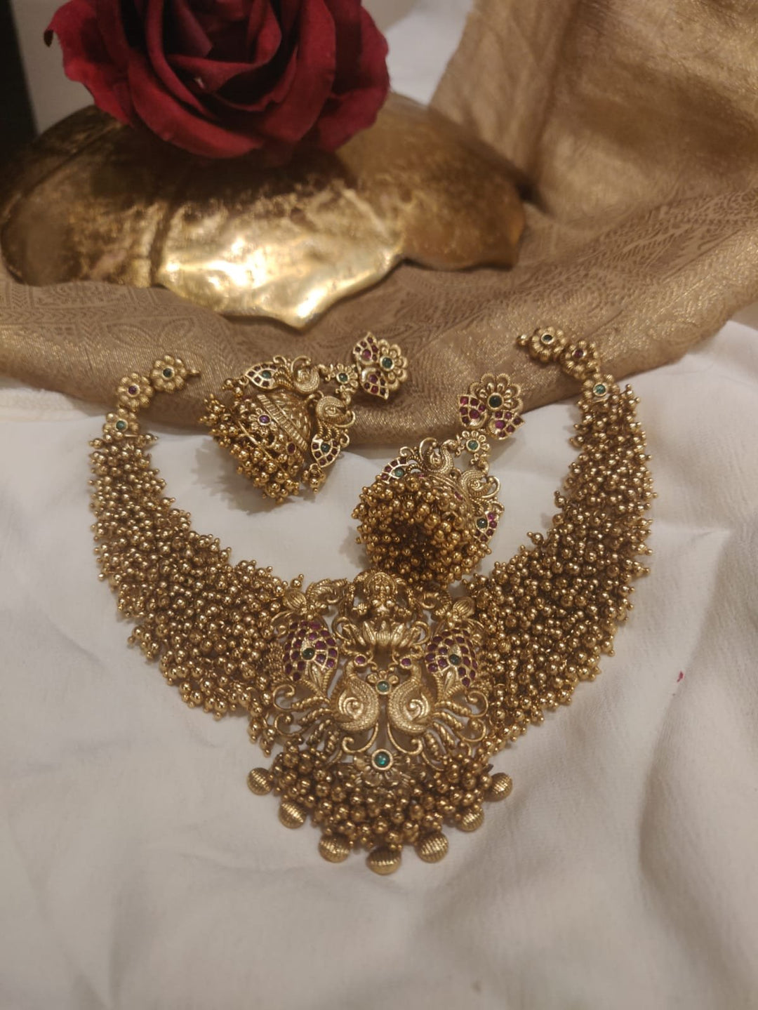 Dazzling Golden Pearl Peacock Design Lakshmi Short Necklace