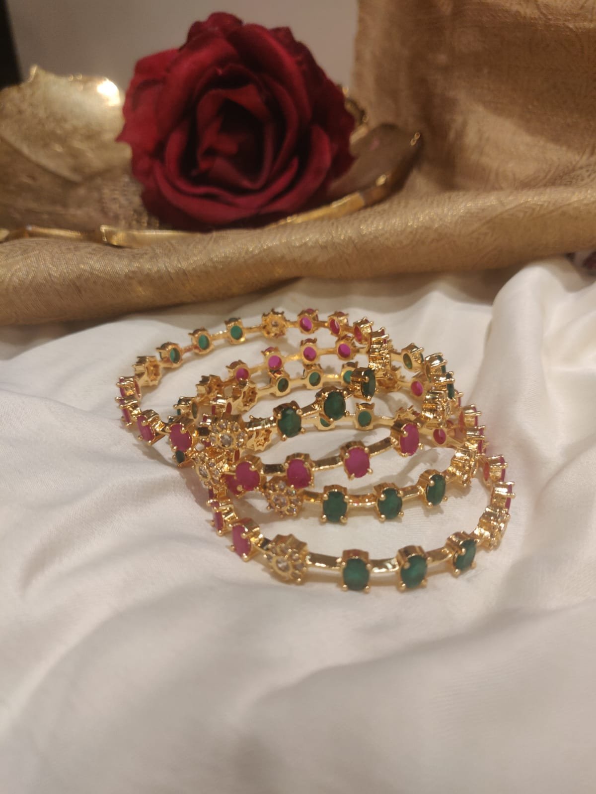 Timeless red and green stone bangles set of 4