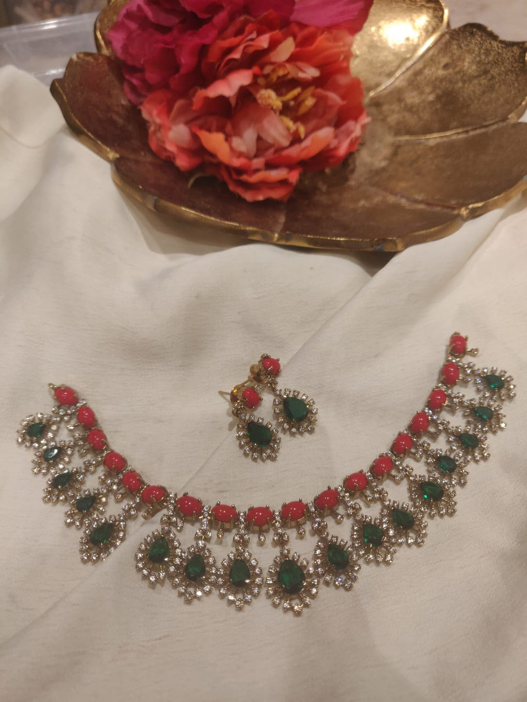 Opulent Red AD Stone Necklace With Green Floral Droplet Choker