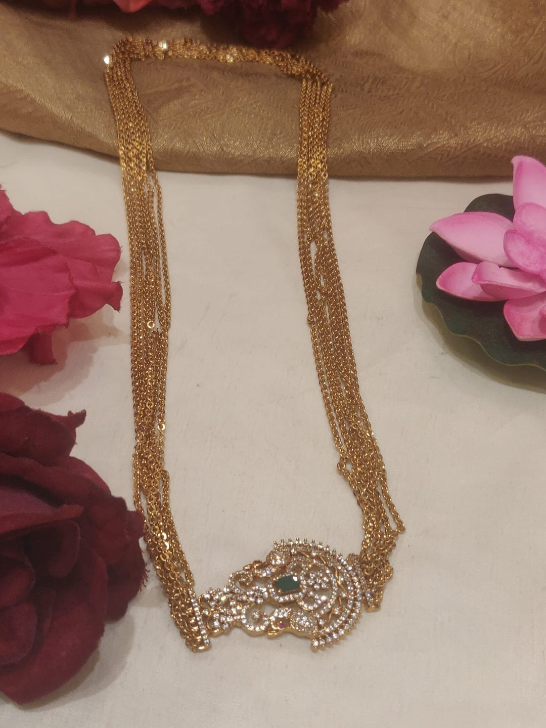 Tantalizing Multilayer Chain With Green AD Peacock