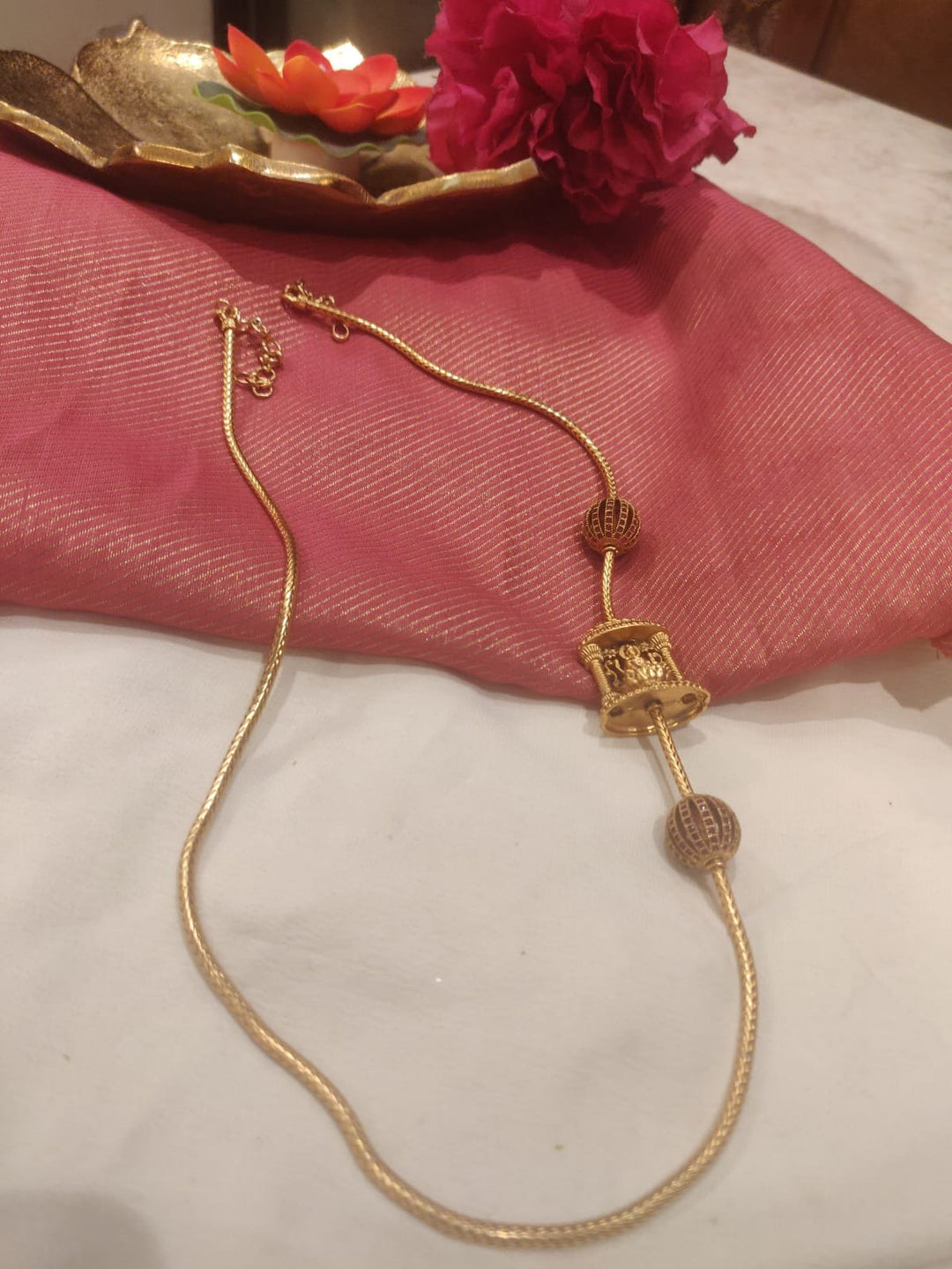 Timeless Golden Long Rope With Lakshmi Design And Red Round design