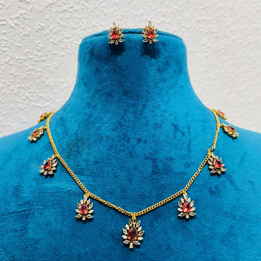 Jubilant Ethereal Pinnacle floral deisgn red blood stone gold chain necklace