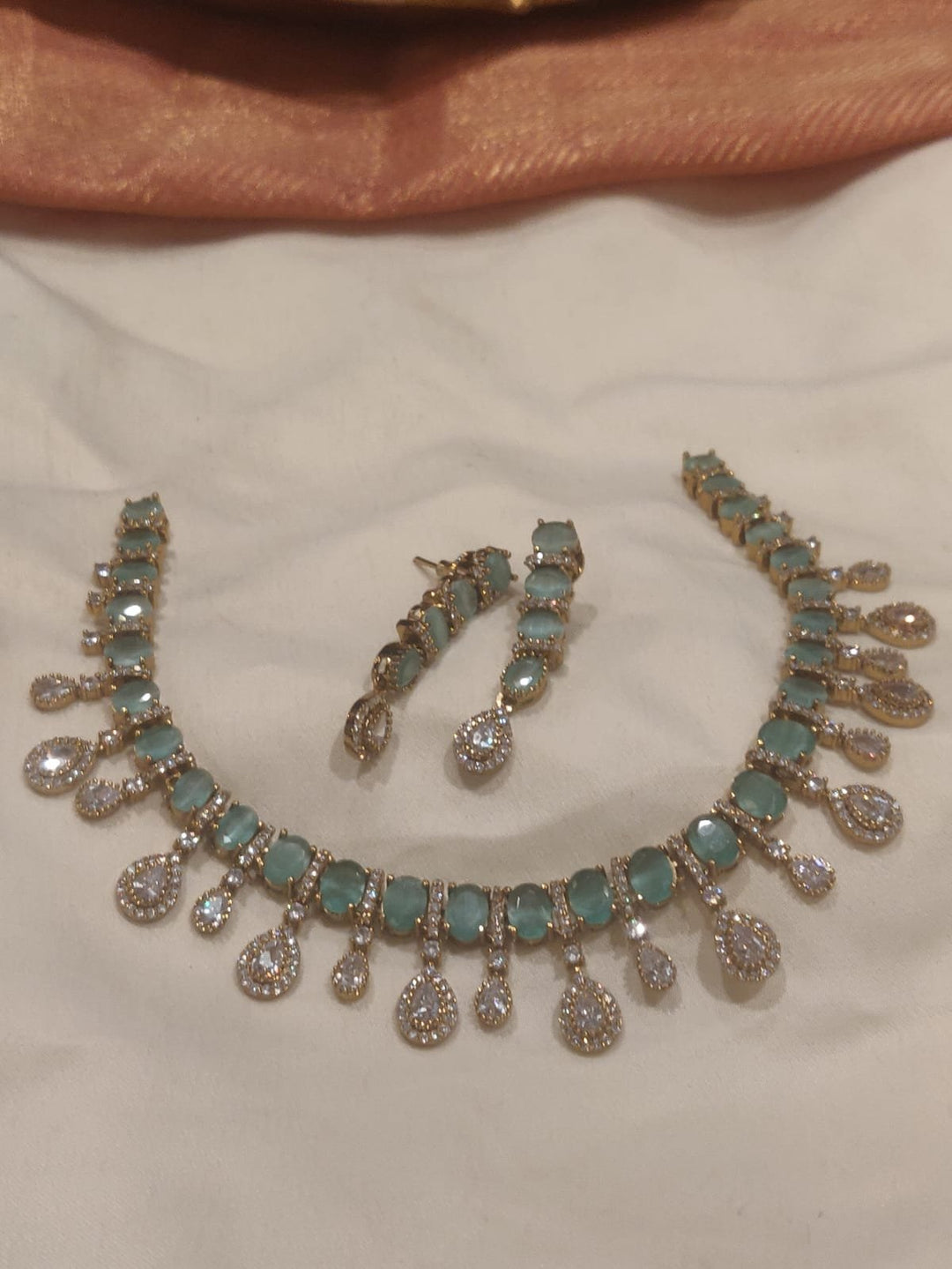 Enigmatic crystal Necklace with Skyblue Ad Stone