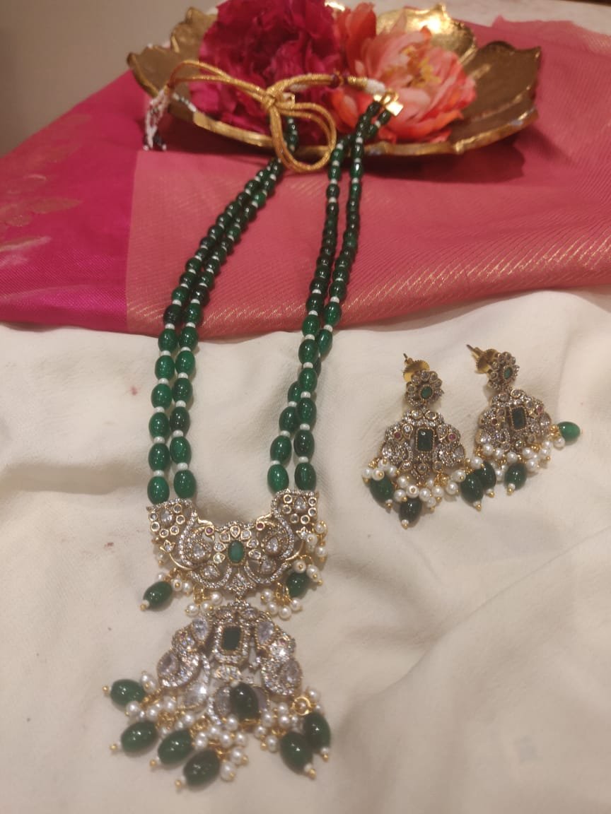 Lustrous Handcrafted 2 Layer Green Mala With Peacock Pendant white Green Beads