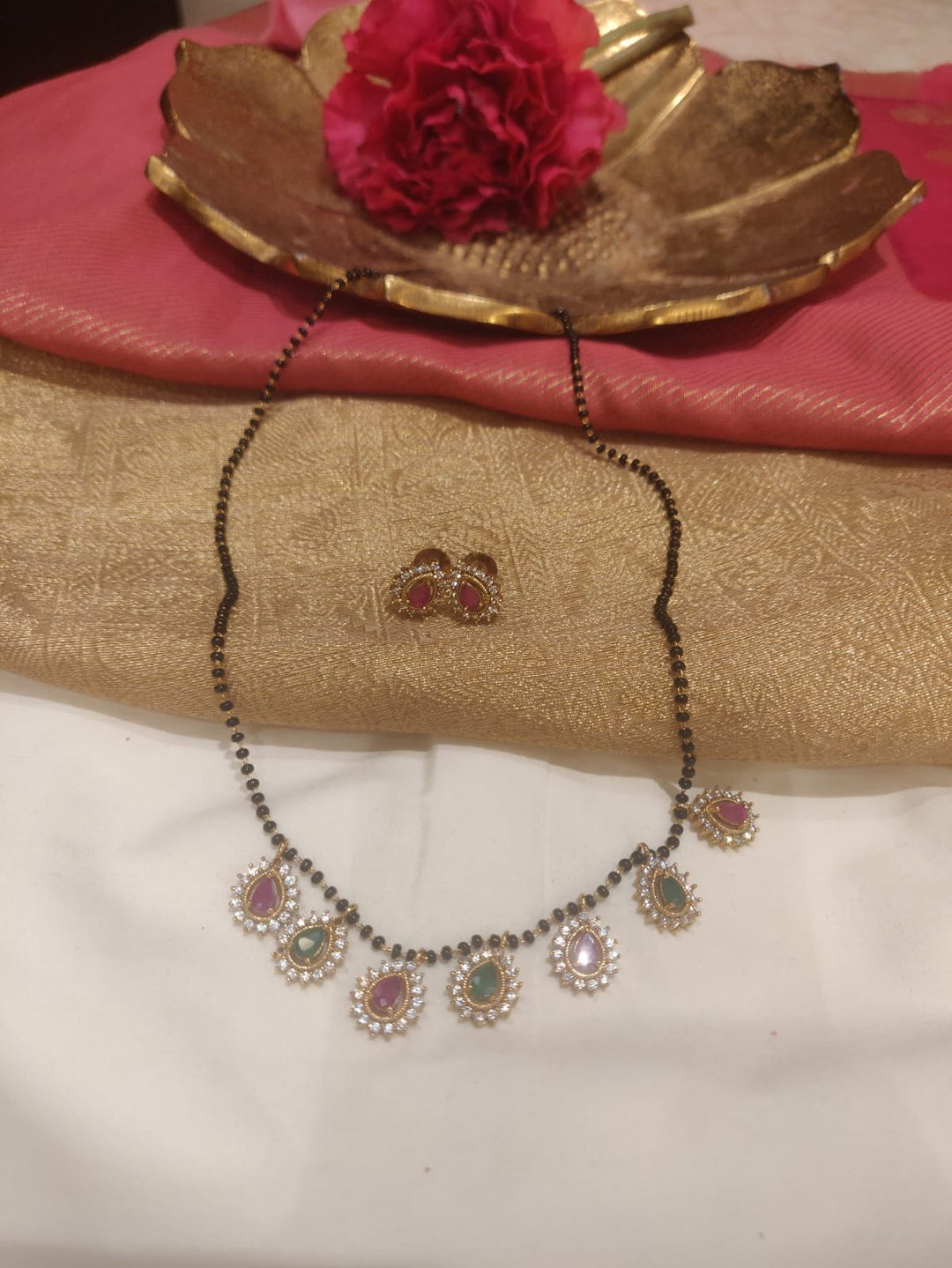 Timeless Mangalsutra With Green Red AD Stone